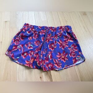My loss your gain: Athleta Purple Floral Athletic Shorts size large EUC